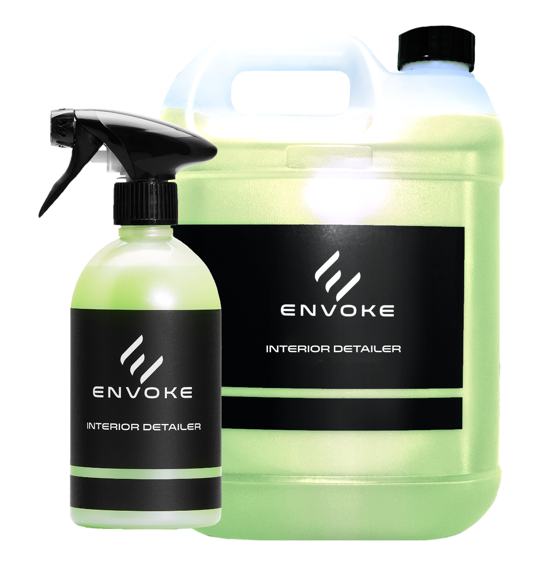 2 botlles of envoke interior detailer on white background