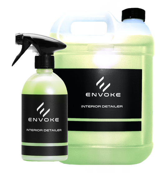 2 botlles of envoke interior detailer on white background
